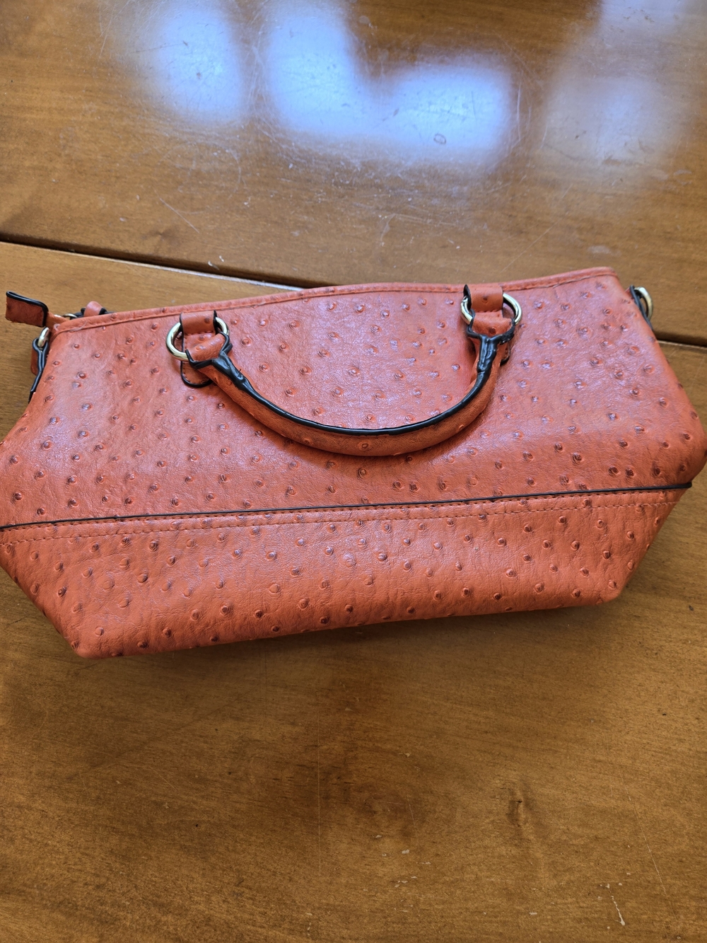 Textured Orange Ostrich-Style Wristlet Clutch